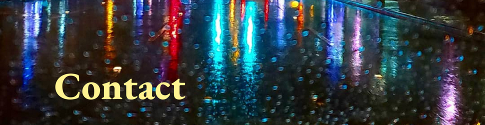 Colorful lights at night in the rain with yellow text that says, "Contact"