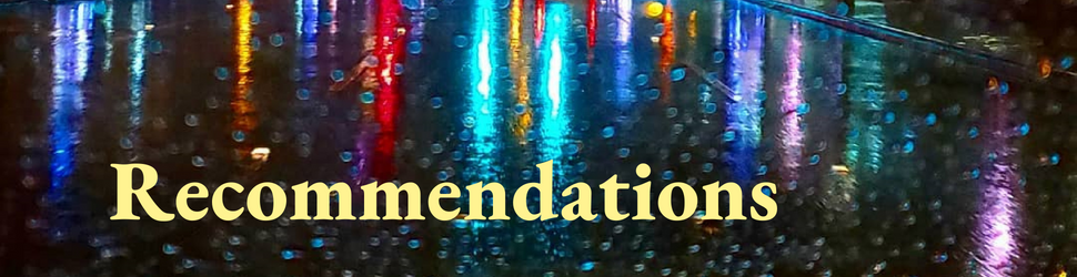 Colorful lights at night in the rain with yellow text that says, "Recommendations"
